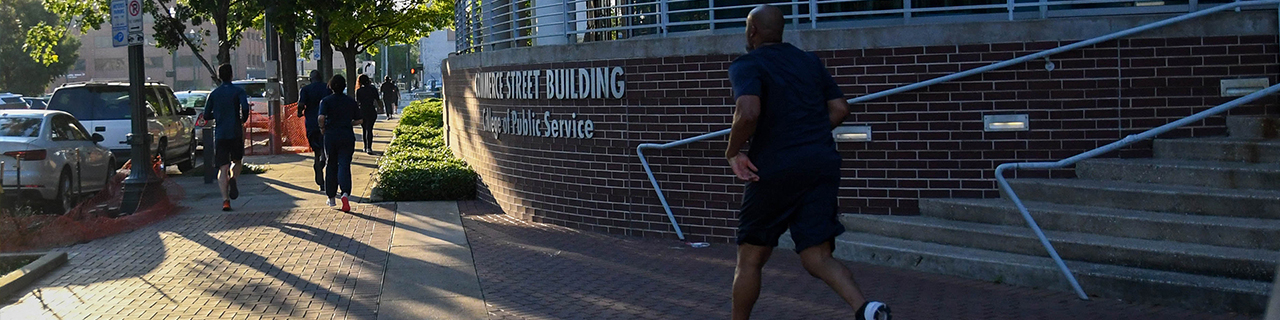 Cadets Running around Commerce St. Building