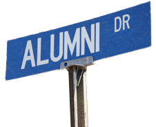 street sign that says "Alumni Drive"