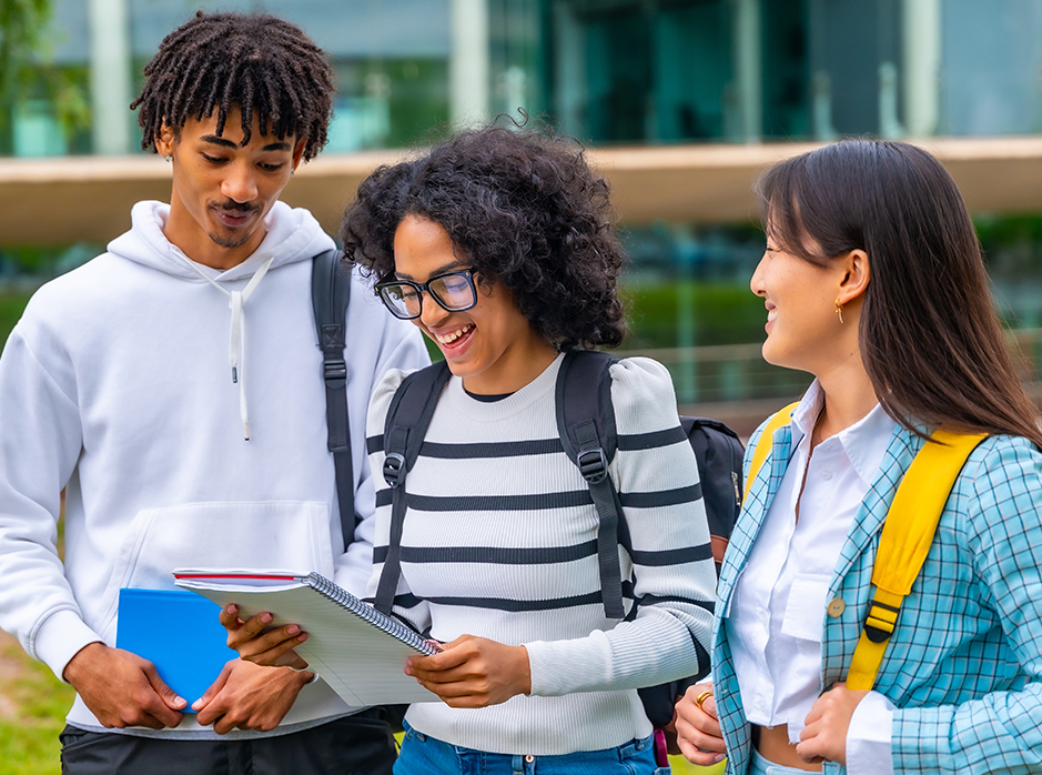 Students smiling and interacting.