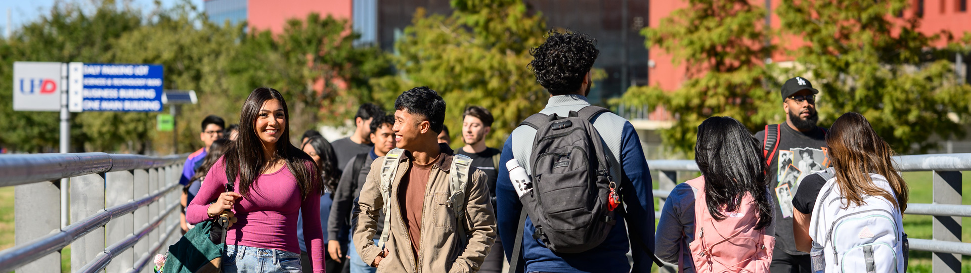 UHD Students walking over the Bayou