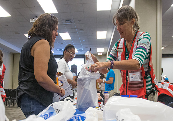 Volunteers preparing emergency kits for the community