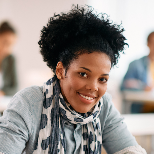 international student smiling at the camera