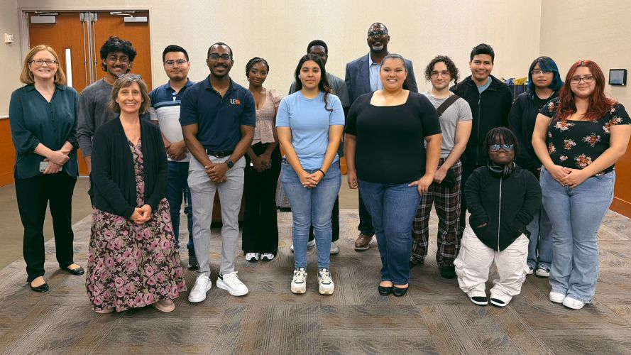 Students and professors who participated in the photography exhibition