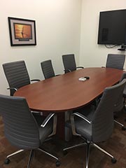 empty conference table and chairs