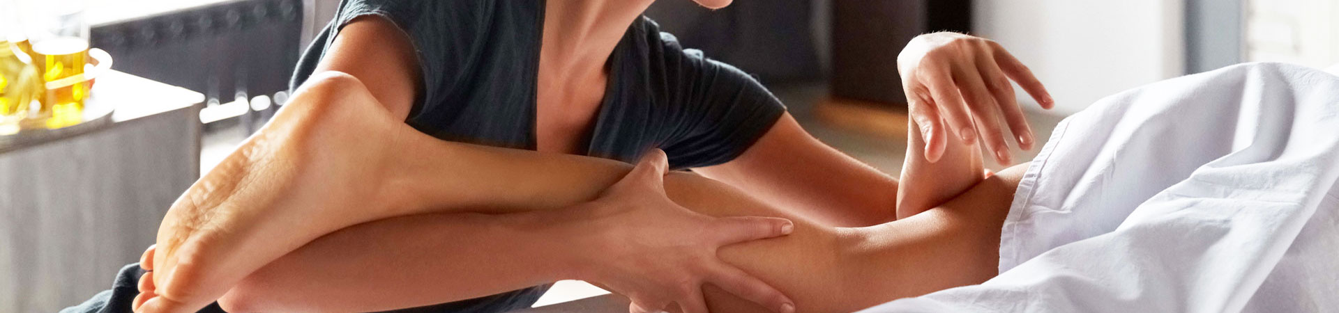 person receiving a calf massage