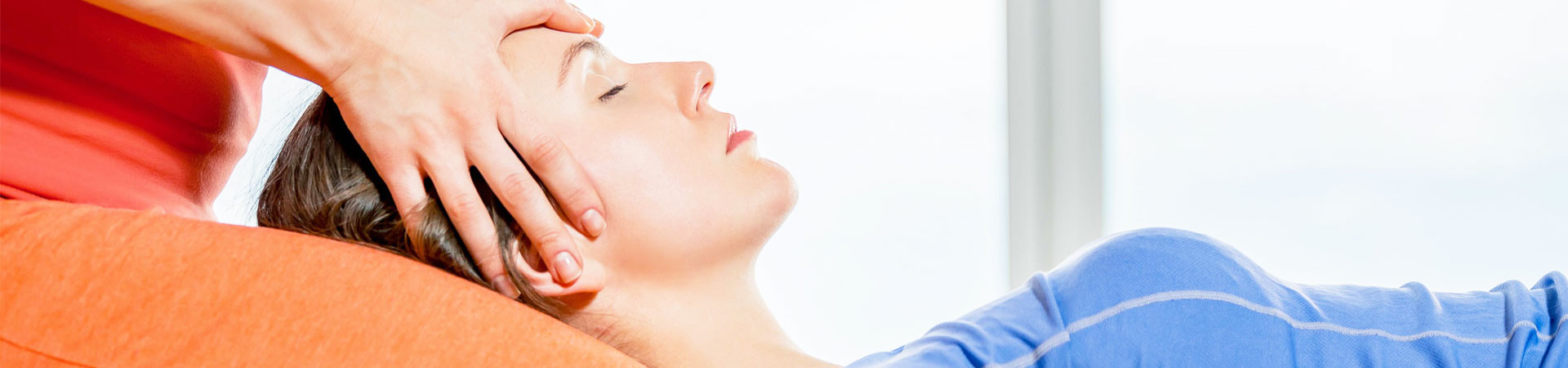 woman receiving a head massage