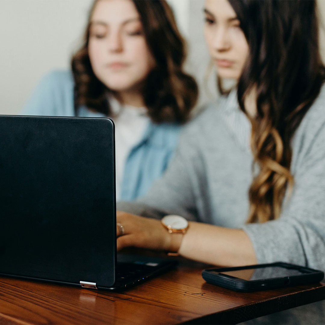 woman holding 20 dollar bills