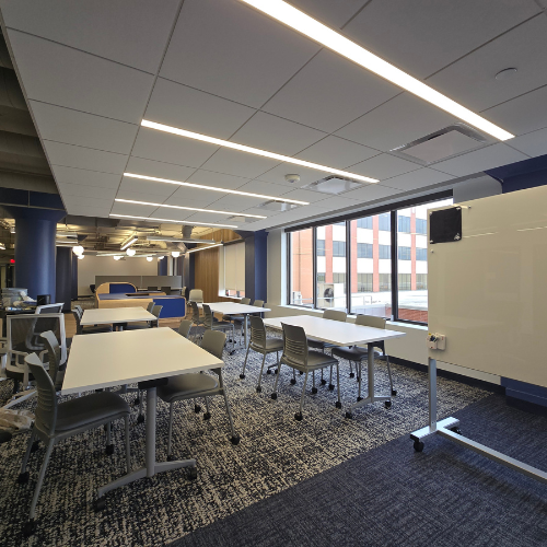 Tables, chairs in open concept space on newly renovated floor of university of houston downtown's one main building. the renovation is a part of the gator expansion project. 
