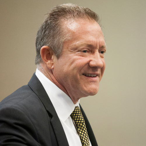 Dr. William K. Barksdale, former Professor of Management and an MBA Faculty Director, smiles