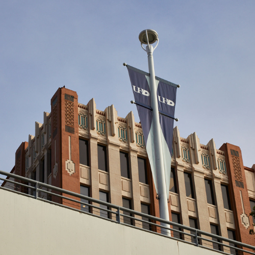 One Main Building at the University of Houston-Downtown campus in downtown houston. Bridge over bayou leading to One Main Street.
